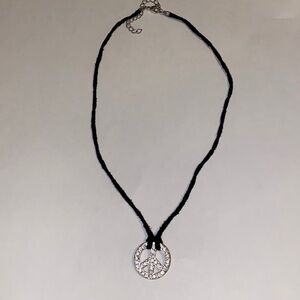 Avon peace sign necklace